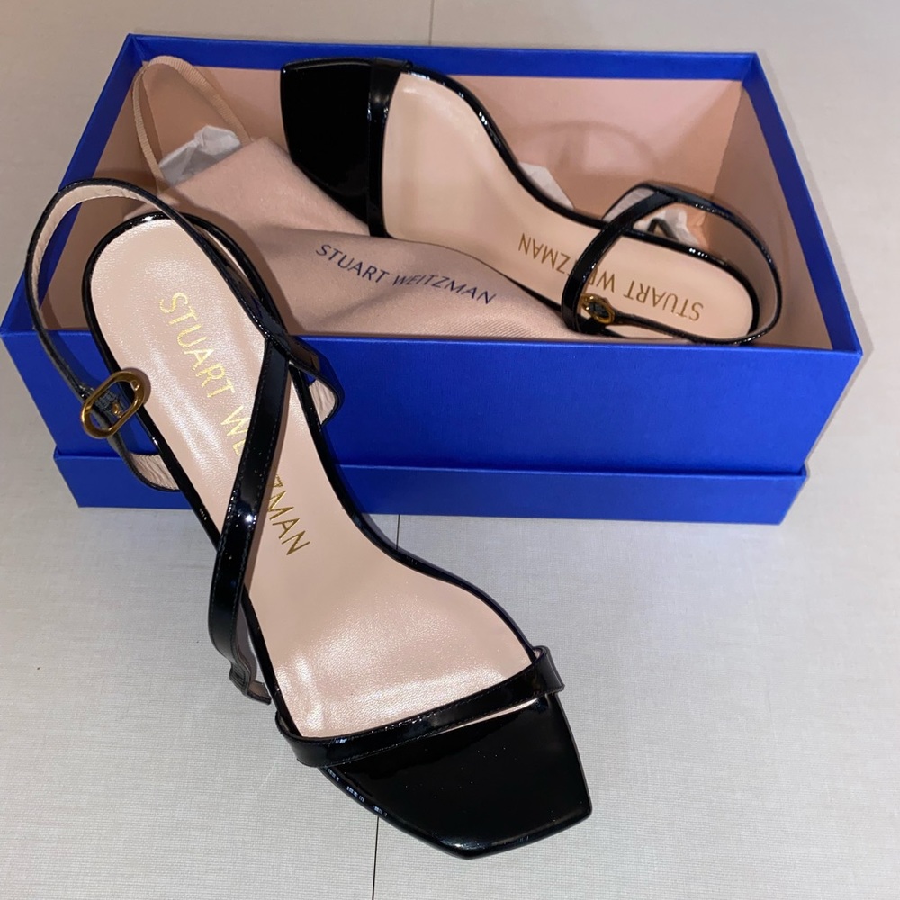 Stuart Weitzman, black patent leather high heeled sandals.